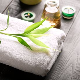 Clean Folded Spa Towel On Graywashed Surface